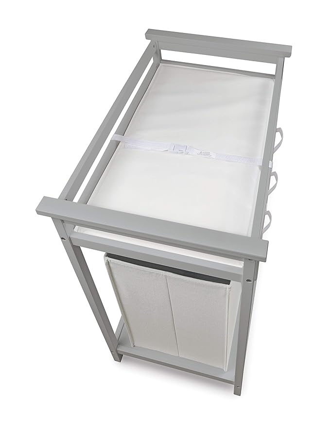 Badger Basket Modern Baby Changing Table - Nursery Furniture with Laundry Hamper and 3 Storage Drawers - Diaper Changing Station with Safety Belt, Changing Pad, Organizer Baskets - Cool Gray and White
