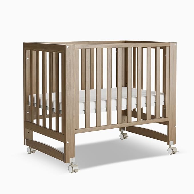 EvoNest Baby Crib, 6 in 1 Convertible Mini Crib with Wheels, 100% New Zealand Wood Growing Bed, 4 Adjustable Mattress Height，Walnut Brown (Walnut Brown)