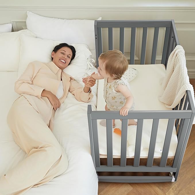 EvoNest Baby Crib, 6 in 1 Convertible Mini Crib with Wheels, 100% New Zealand Pinewood Growing Bed, 4 Adjustable Mattress Height，Washed Natural (Grey)